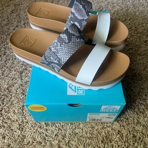 Reef Black and White Slide Sandals